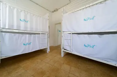 Cama o camas de una habitación en Hostel Las Palmas by Youroom