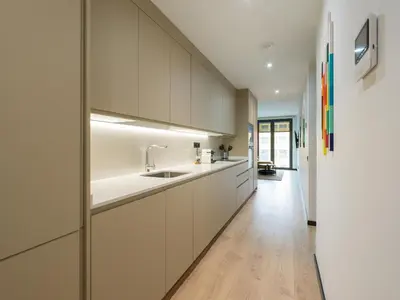 Una cocina o zona de cocina en Apartamento con gimnasio cerca de la playa de Las Canteras A1B