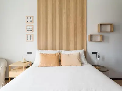 Cama o camas de una habitación en Apartamento con gimnasio cerca de la playa de Las Canteras A1B