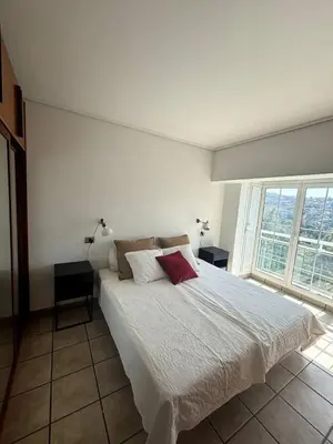 Cama o camas de una habitación en Apartamento-Estudio con vistas