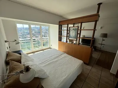Cama o camas de una habitación en Apartamento-Estudio con vistas