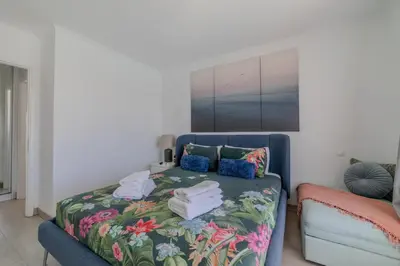 Cama o camas de una habitación en Bungalow jacuzzi PDI terraza