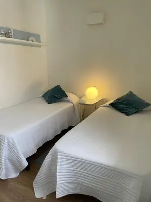 Cama o camas de una habitación en San Agustín BeachSun Relax