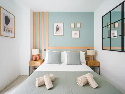 Cama o camas de una habitación en Despirta en el jardin de las musas GB1B