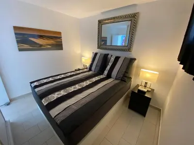 Cama o camas de una habitación en Solymar Luxus Apartment