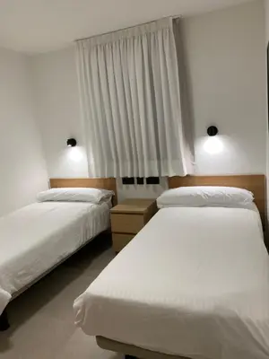 Cama o camas de una habitación en Las Brisas 26