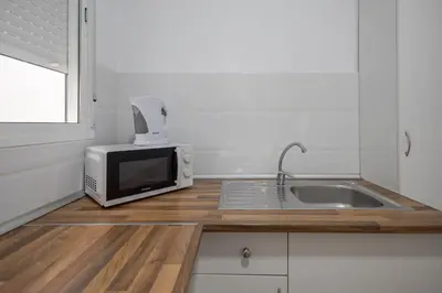 Una cocina o zona de cocina en The Sweet Home - 3BR & 4 min Las Canteras