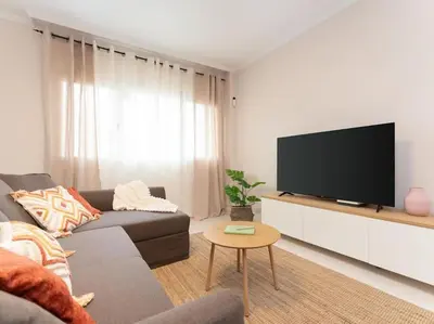 Una televisión o centro de entretenimiento en Vivelorural Confital Home vista Canteras