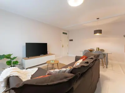 Una televisión o centro de entretenimiento en Vivelorural Confital Home vista Canteras