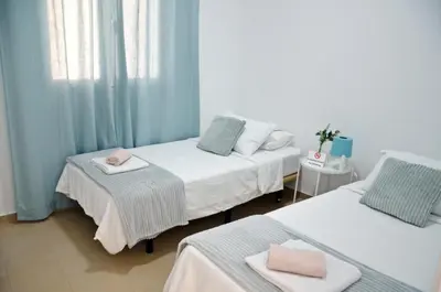 Cama o camas de una habitación en Laia&Beach