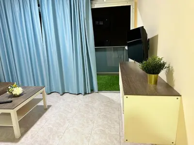 Una televisión o centro de entretenimiento en Apartamento Anau- Playa del inglés - Yumbo