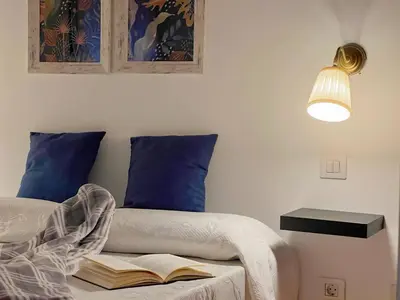 Cama o camas de una habitación en Suites Esencia Atlántica: Mar, montaña y relax