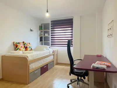 Cama o camas de una habitación en Suites Esencia Atlántica: Mar, montaña y relax