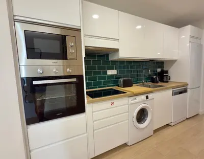 Una cocina o zona de cocina en Green Pier Home Holidays