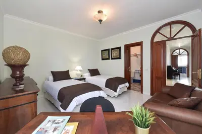 Cama o camas de una habitación en Seaview Holiday Rental by VillaGranCanaria
