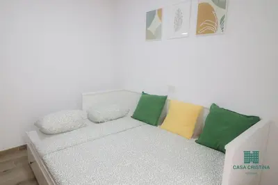 Cama o camas de una habitación en Casa en Playa de Arinaga