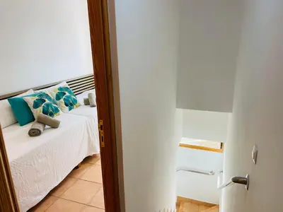 Cama o camas de una habitación en Las Brisas 51 by SunHousesCanarias