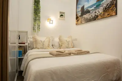 Cama o camas de una habitación en Dom Kubus Playa de Mogán