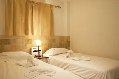 Cama o camas de una habitación en Villa Magna