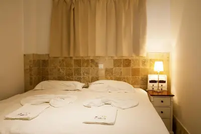 Cama o camas de una habitación en Villa Magna