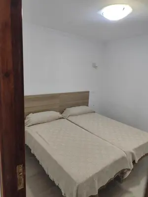 Cama o camas de una habitación en Apartamento Canteras beach