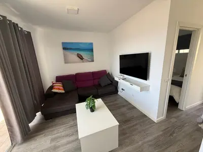 Una televisión o centro de entretenimiento en Solarena - Sol44