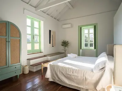 Cama o camas de una habitación en Suite Olivos
