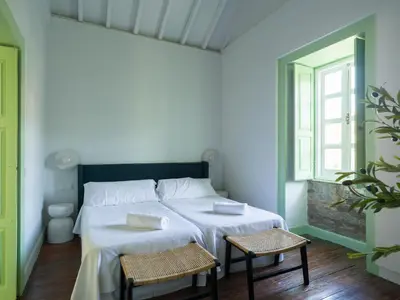 Cama o camas de una habitación en Suite Olivos