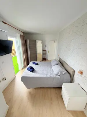 Cama o camas de una habitación en Casa Liliana