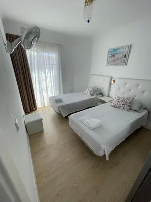 Cama o camas de una habitación en Casa Liliana
