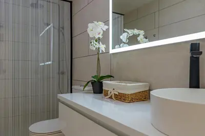 Un baño de HORIZON VACATION HOME - Casa Feliz