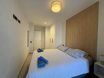 Cama o camas de una habitación en Las Canteras Deluxe