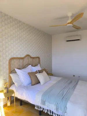 Cama o camas de una habitación en Meloneras Garden Bungalow