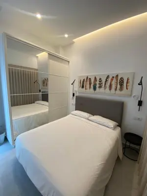 Cama o camas de una habitación en LITTLE NELL casa compartida