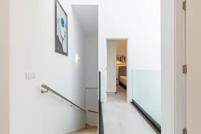 Una televisión o centro de entretenimiento en LITTLE NELL casa compartida
