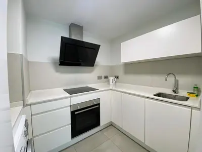Una cocina o zona de cocina en Las Canteras Deluxe