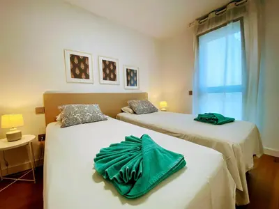 Cama o camas de una habitación en Las Canteras Deluxe