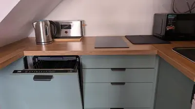 Una cocina o zona de cocina en Cosy Bungalow with Terrace & Jacuzzi