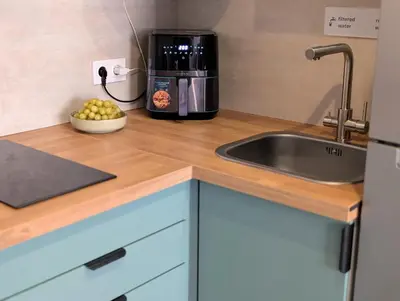 Una cocina o zona de cocina en Cosy Bungalow with Terrace & Jacuzzi