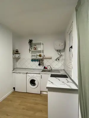 Una cocina o zona de cocina en Las Canteras Beach Promenade