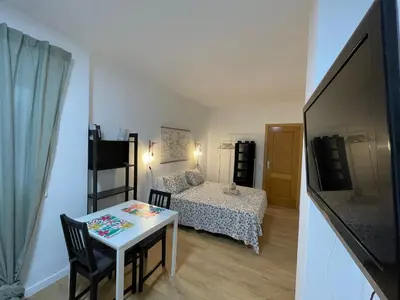 Cama o camas de una habitación en Las Canteras Beach Promenade