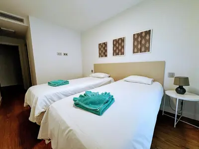 Cama o camas de una habitación en Las Canteras Deluxe