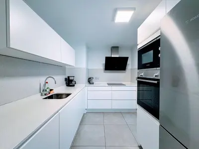 Una cocina o zona de cocina en Las Canteras Deluxe