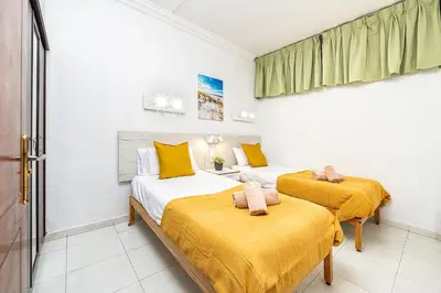 Cama o camas de una habitación en Beach View Apartment I