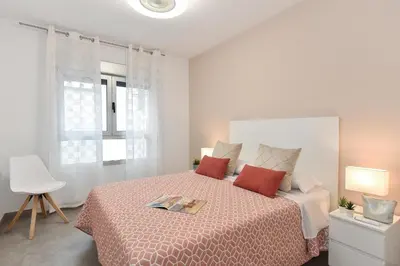 Cama o camas de una habitación en El Corazon en el Puerto by VillaGranCanaria