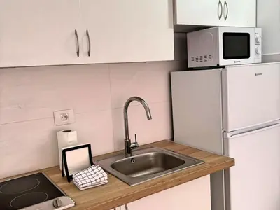 Una cocina o zona de cocina en Smiling Holiday Home