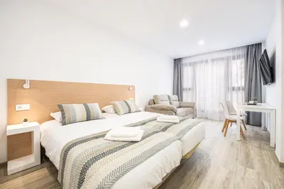 Cama o camas de una habitación en La Marquesa Ten Suites Canteras