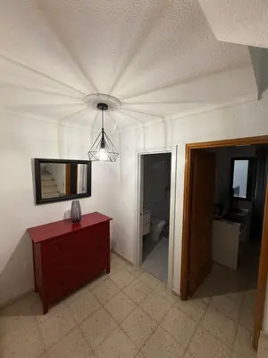 Una televisión o centro de entretenimiento en Casa Tamarán
