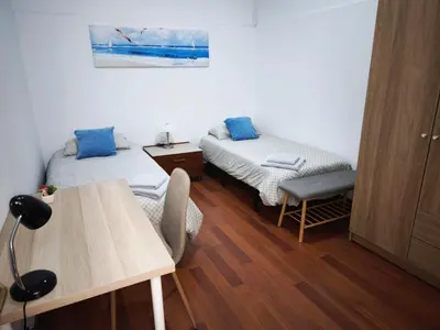 Cama o camas de una habitación en Auditorium and Las Canteras Paradise