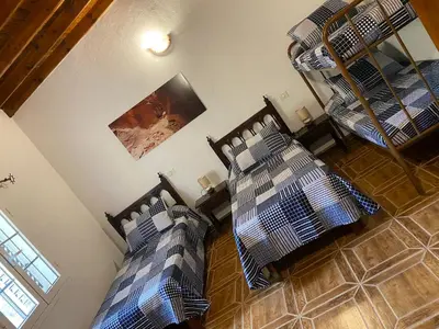Cama o camas de una habitación en Villa las tirajanas